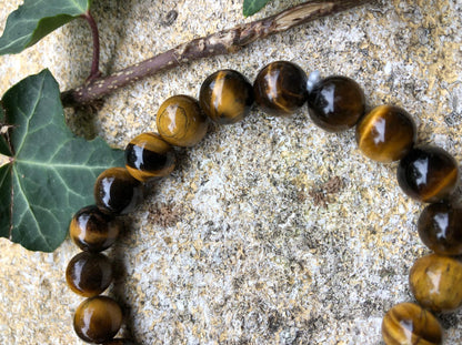 Boutique de lithothérapie en ligne - Photo d'un bracelet en oeil de tigre perle de 10mm